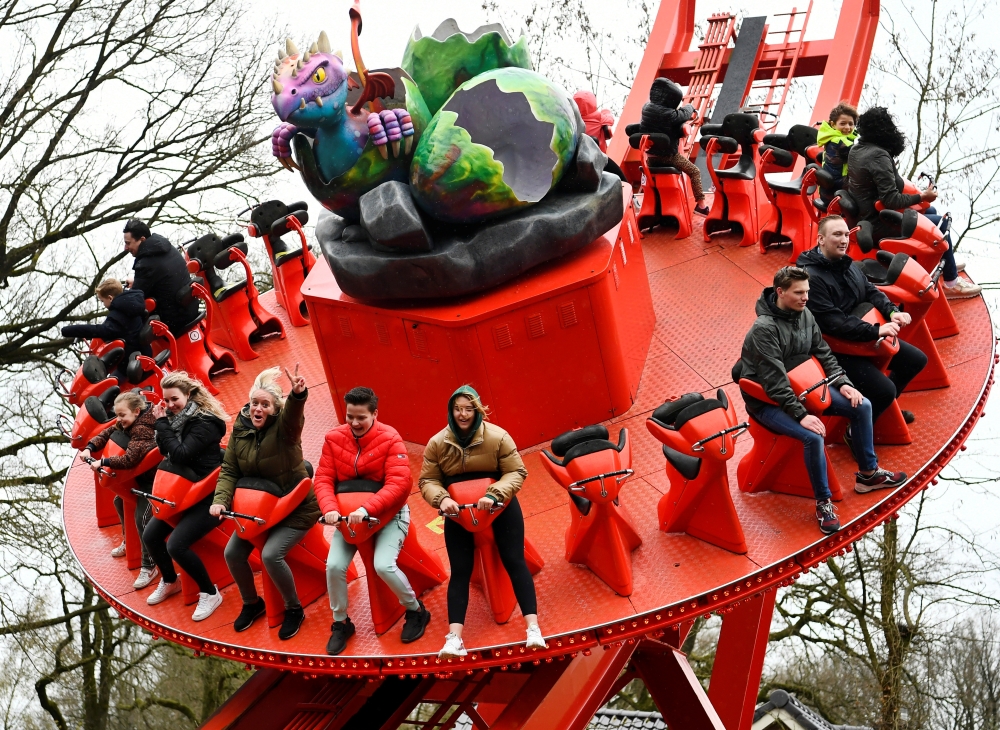 People visit Hellendoorn theme park as part of an experiment by the government to test how the tourism, hospitality and culture sectors could open up again after the coronavirus disease (COVID-19) lockdown restrictions, in Hellendoorn, Netherlands April 1