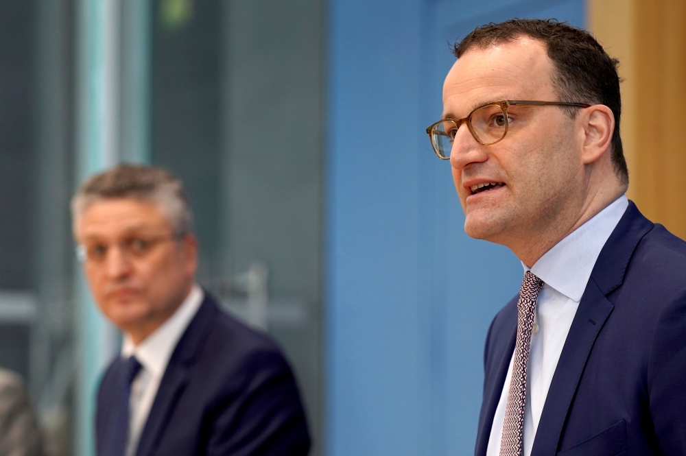 German Health Minister Jens Spahn and Lothar H. Wieler president of the Robert-Koch-Institute German national agency and research institute, responsible for disease control and prevention, attend a press conference on the current coronavirus pandemic, in 
