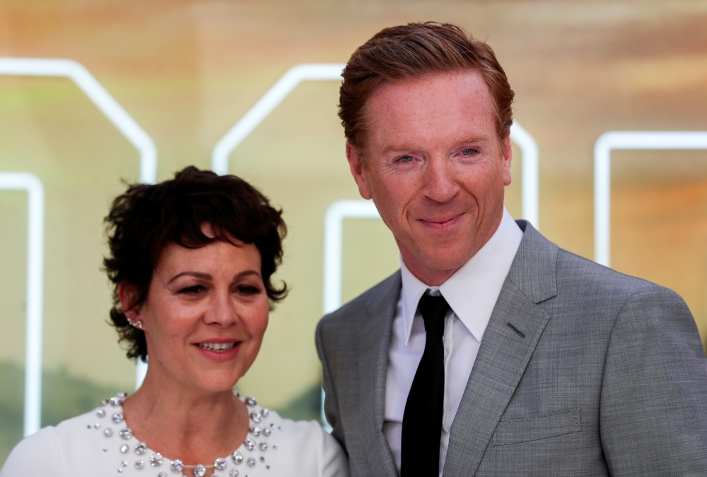 Actor Damian Lewis and his wife Helen McCrory pose as they arrive for the London premiere of 