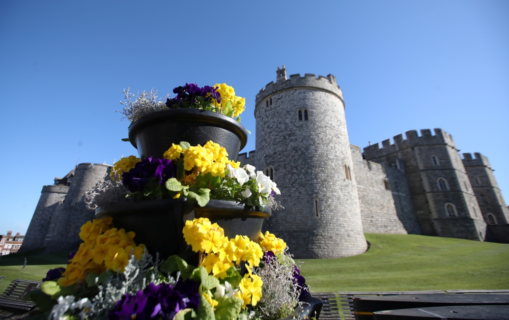 Flowers are pictured outside Windsor Castle on the day of the funeral of Britain's Prince Philip, husband of Queen Elizabeth, who died at the age of 99, in Windsor, near London, Britain April 17, 2021. REUTERS/Peter Cziborra