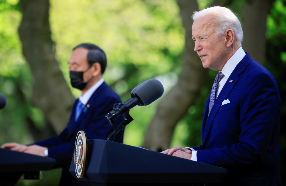 U.S. President Joe Biden speaks alongside Japan's Prime Minister Yoshihide Suga as they hold a joint news conference in the Rose Garden at the White House in Washington, U.S., April 16, 2021. Reuters/Tom Brenner