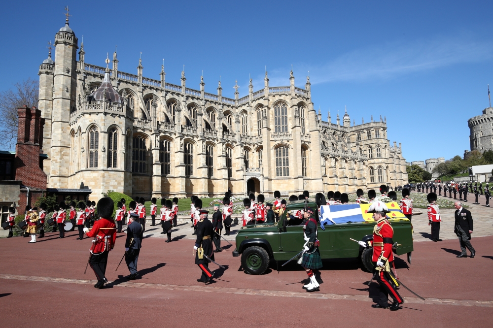 The hearse, a specially modified Land Rover, arrives at St. George's Chapel for the funeral service of Britain's Prince Philip, husband of Queen Elizabeth, who died at the age of 99, in Windsor, Britain, April 17, 2021. (Gareth Fuller/ REUTERS)