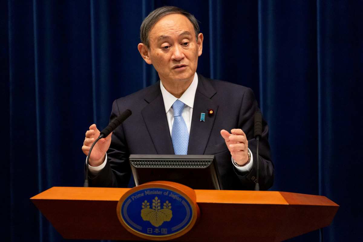FILE PHOTO: Japanese Prime Minister Yoshihide Suga speaks during a news conference in Tokyo, Japan March 5, 2021. Yuichi Yamazaki/Pool via REUTERS//File Photo
