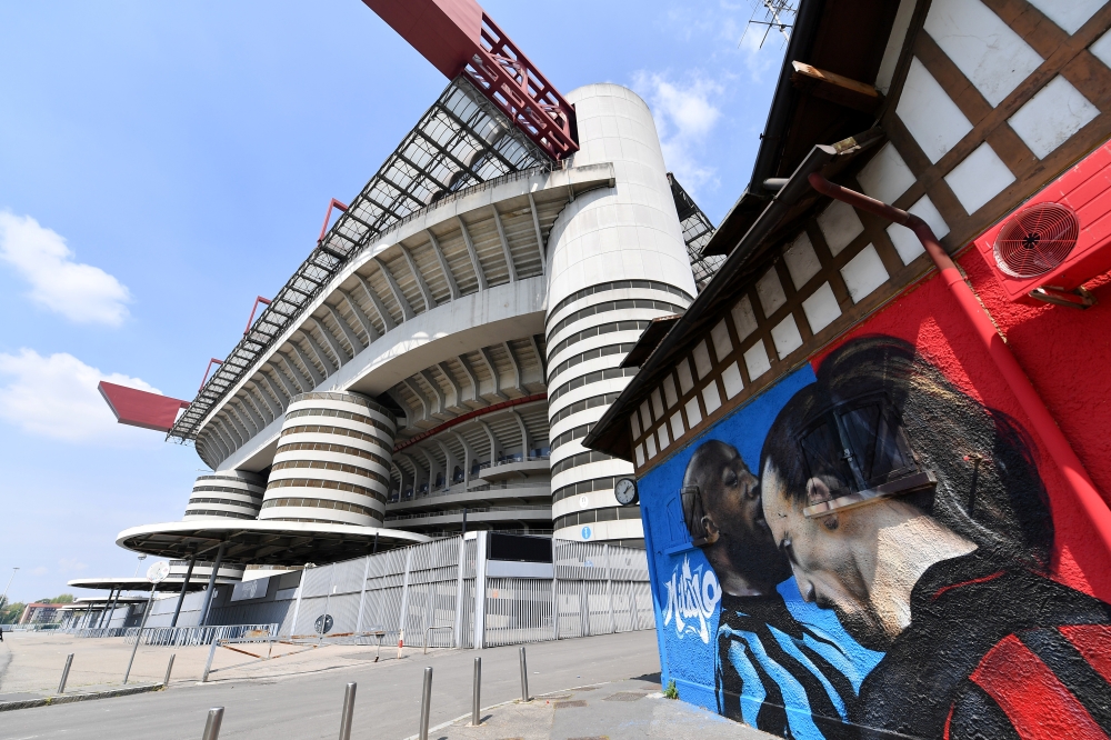 A mural of Inter Milan's Romelu Lukaku and AC Milan's Zlatan Ibrahimovic is seen at the San Siro as twelve of Europe's top football clubs launch a breakaway Super League - Milan, Italy - April 19, 2021 REUTERS/Daniele Mascolo