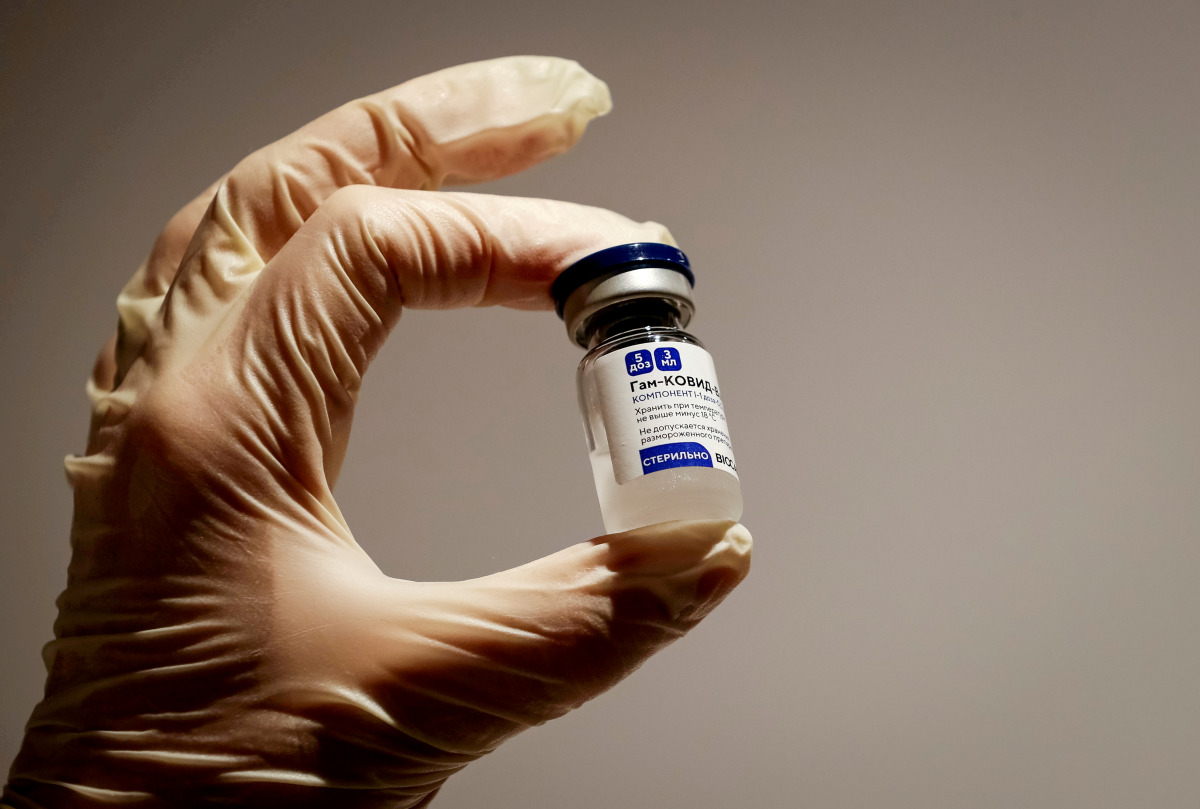 FILE PHOTO: A medical specialist holds a vial of Sputnik V vaccine against the coronavirus in a department store in Moscow, Russia, January 18, 2021 REUTERS/Shamil Zhumatov/File Photo
