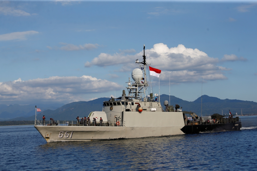 Indonesian Navy's KRI Singa-651 leaves the Tanjung Wangi port as the search continues for the missing KRI Nanggala-402 submarine in Banyuwangi, East Java Province Indonesia, April 24, 2021. Reuters/Ajeng Dinar Ulfiana