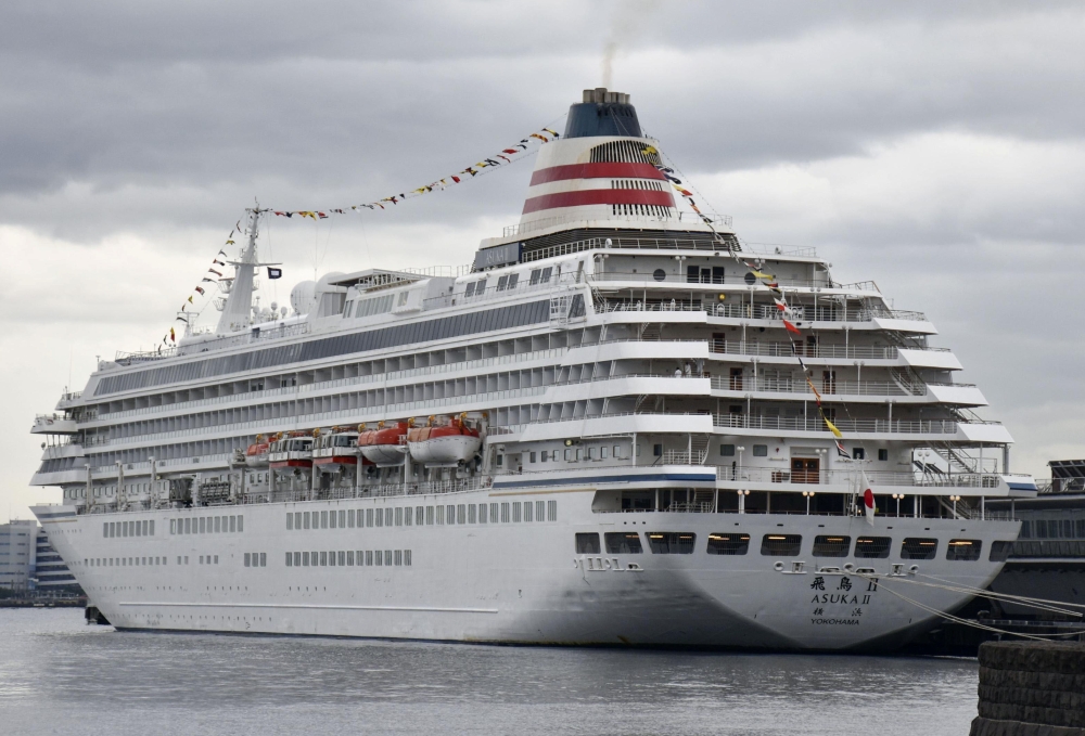 Japanese luxury cruise ship 'Asuka II' is anchored at Yokohama port in Yokohama, south of Tokyo, Japan in this photo taken by Kyodo November 2, 2020. Picture taken November 2, 2020. Kyodo/via REUTERS
