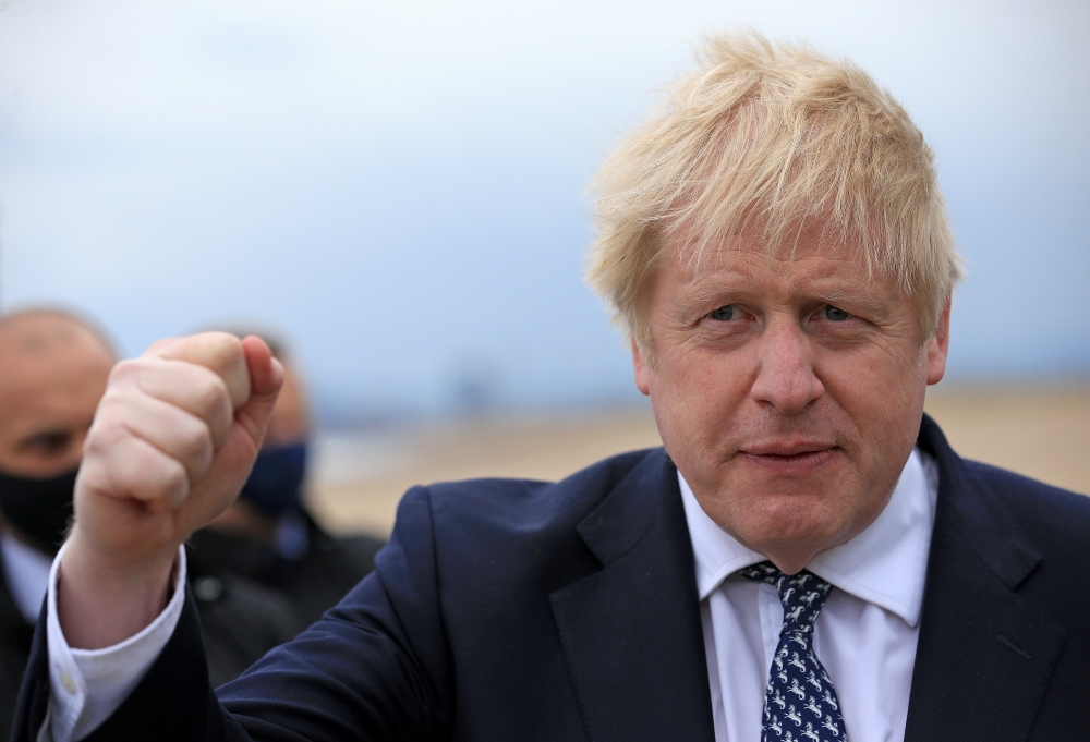 Britain's Prime Minister Boris Johnson gestures as he campaigns on behalf of Conservative Party candidate Jill Mortimer in Hartlepool, Britain May 3, 2021. Lindsey Parnaby/Pool via REUTERS
