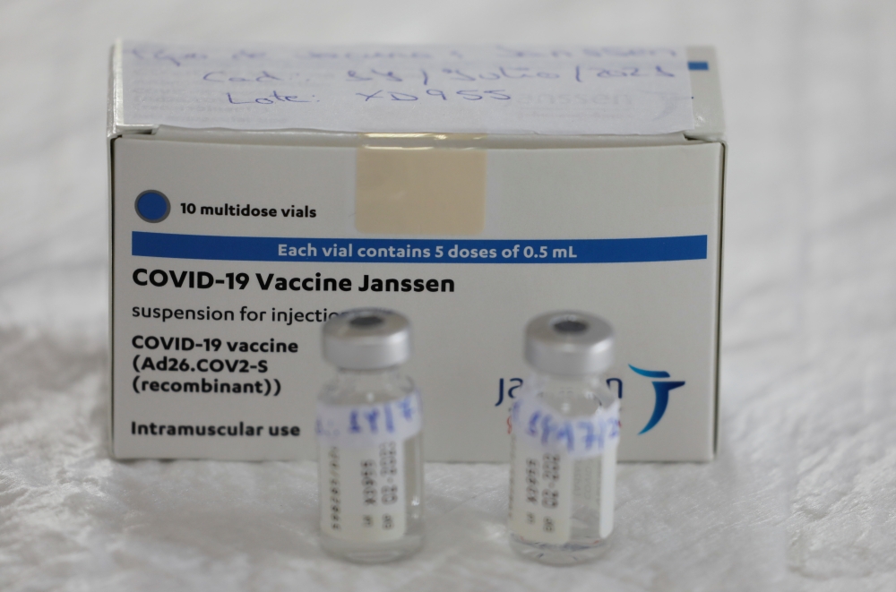 Empty vials of Johnson & Johnson's coronavirus disease (COVID-19) vaccine are seen on a table at a vaccination centre in Ronda, Spain, April 23, 2021. REUTERS/Jon Nazca/File Photo