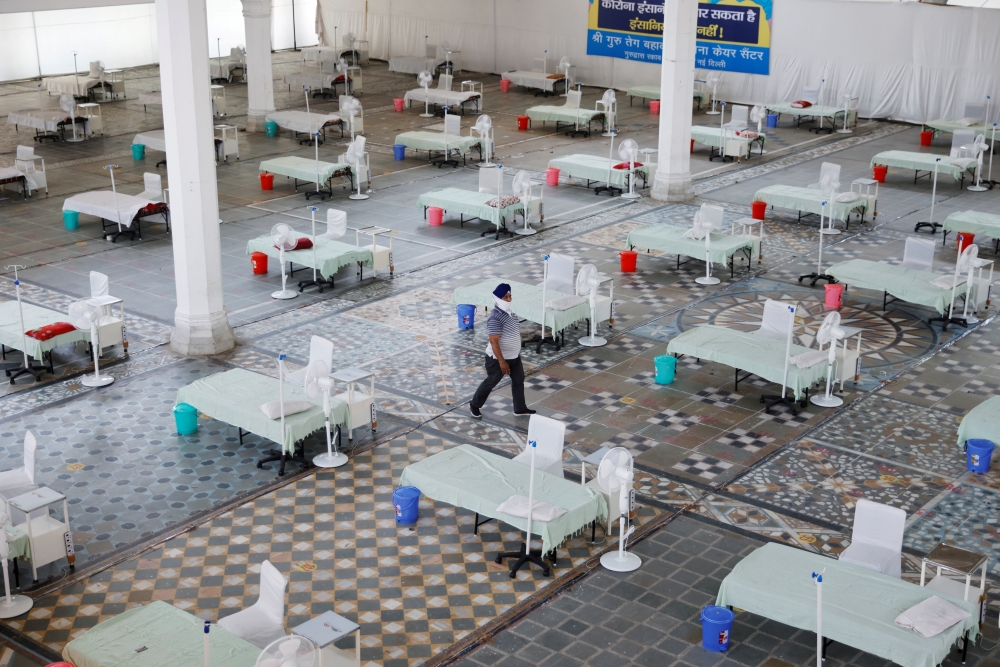Beds are seen inside a Gurudwara (Sikh Temple) converted into a coronavirus disease (COVID-19) care facility amidst the spread of the COVID-19 in New Delhi, India May 5, 2021. REUTERS/Adnan Abidi