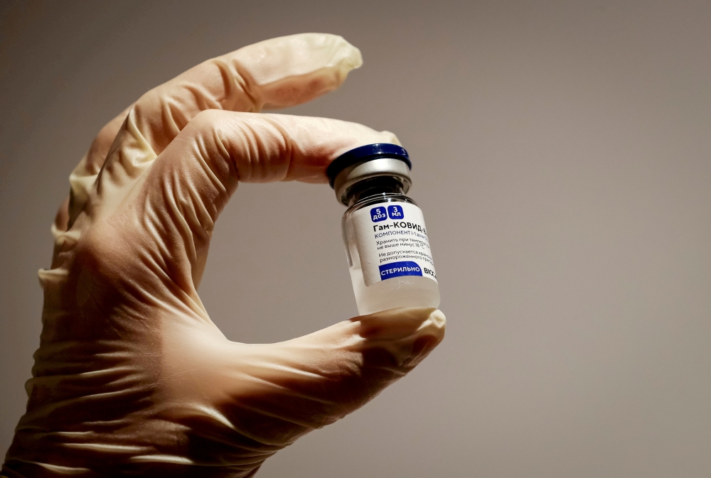 File photo: A medical specialist holds a vial of Sputnik V vaccine against the coronavirus in a department store in Moscow, Russia, January 18, 2021. Reuters/Shamil Zhumatov/File Photo