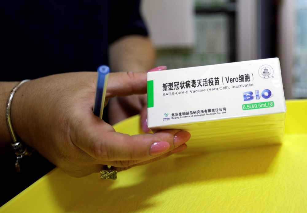 File photo: A healthcare worker in North Macedonia handles China's Sinopharm coronavirus disease (COVID-19) vaccines at a sport centre, as the country continues its mass inoculation campaign, in Stip, North Macedonia May 6, 2021. Reuters/Ognen Teofilovski