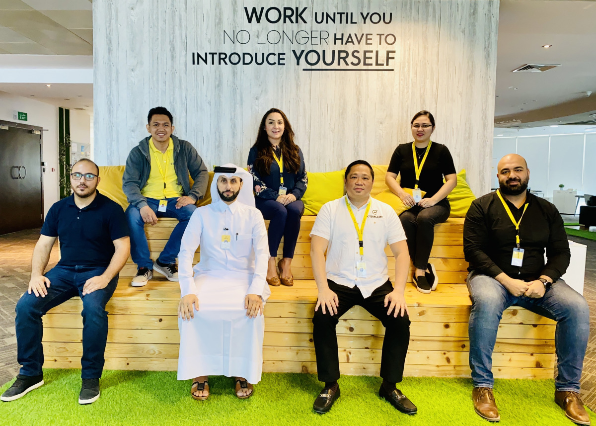The Cwallet operations team posing for a group photo.
