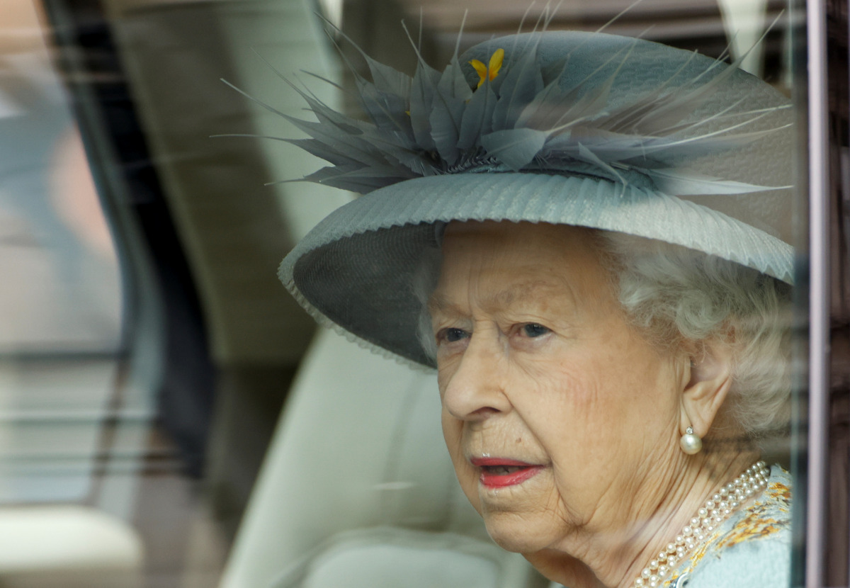 Britain's Queen Elizabeth arrives for the State Opening of Parliament at the Palace of Westminster, where a scaled-back ceremony takes place due to the coronavirus disease (COVID-19) restrictions, in London, Britain, May 11, 2021. REUTERS/John Sibley
