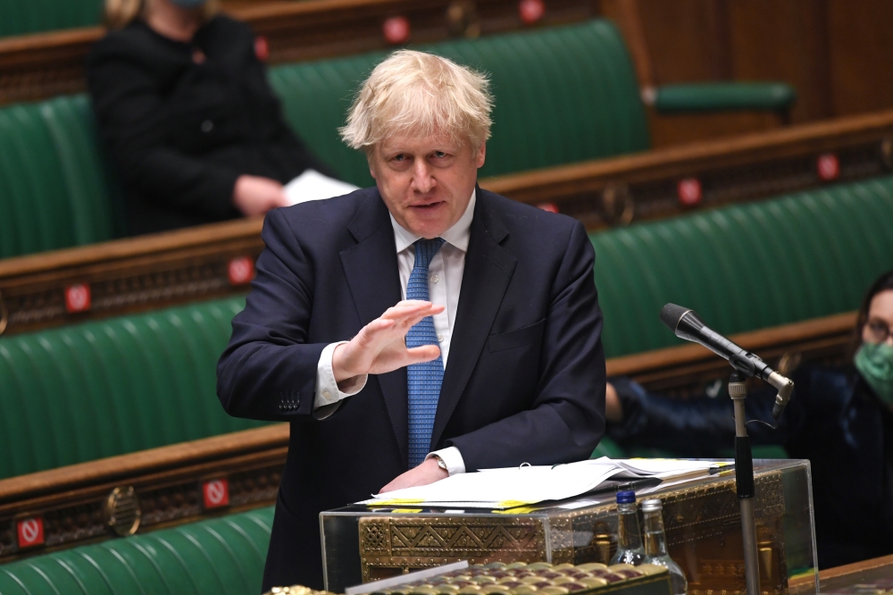 Britain's Prime Minister Boris Johnson speaks in Parliament in London, Britain May 12, 2021. UK Parliament/Jessica Taylor/Handout via Reuters