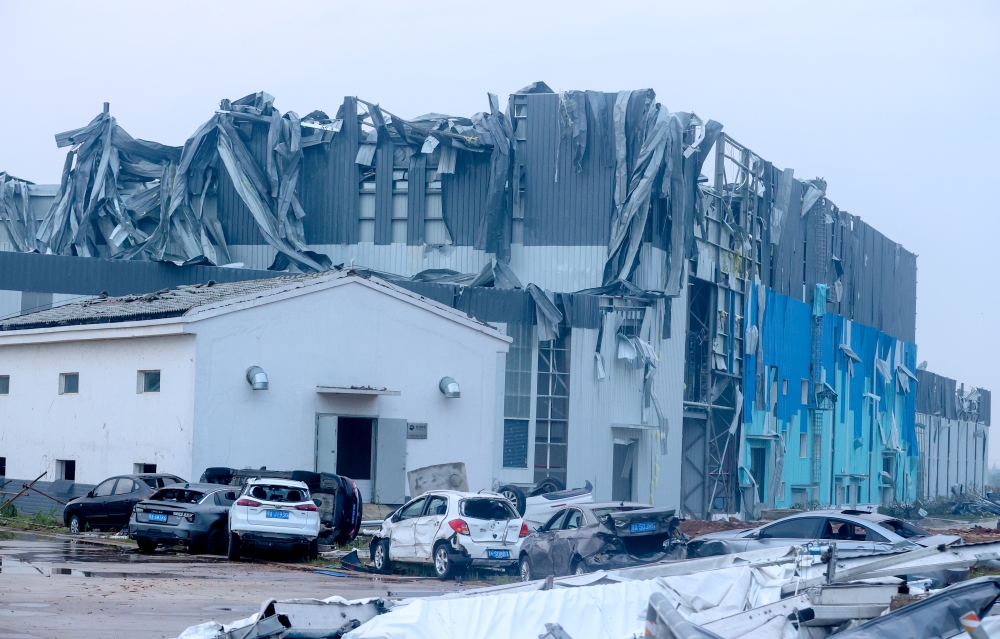 A plant under construction is seen damaged after a tornado ripped through Caidian district of Wuhan, Hubei province, China May 15, 2021. cnsphoto via REUTERS 