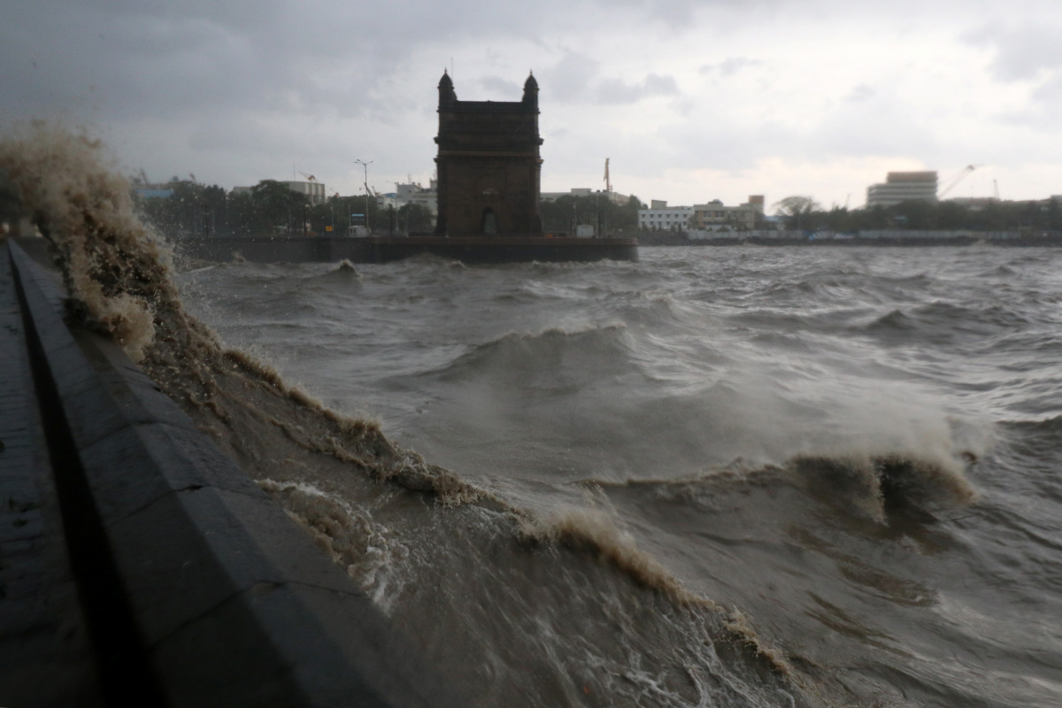 Waves caused by Cyclone Tauktae crash up on the promenade near the Gateway of India monument in Mumbai, India, May 17, 2021. REUTERS/Niharika Kulkarni

