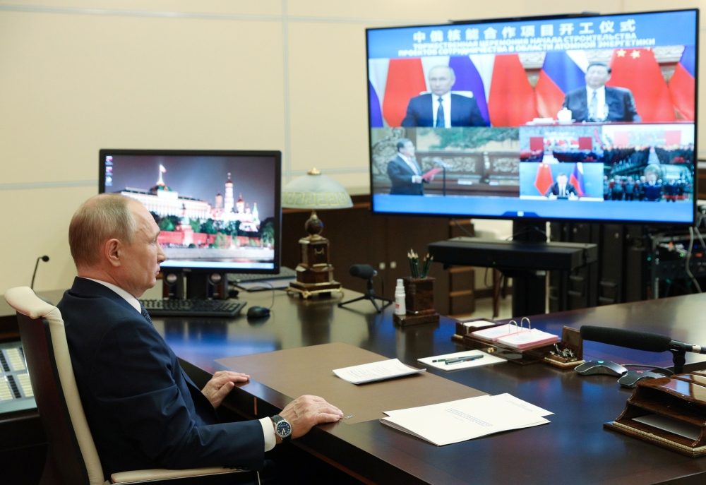 Russian President Vladimir Putin attends an opening ceremony of the Russian-Chinese nuclear energy cooperation project via a video link at the Novo-Ogaryovo state residence outside Moscow, Russia May 19, 2021.