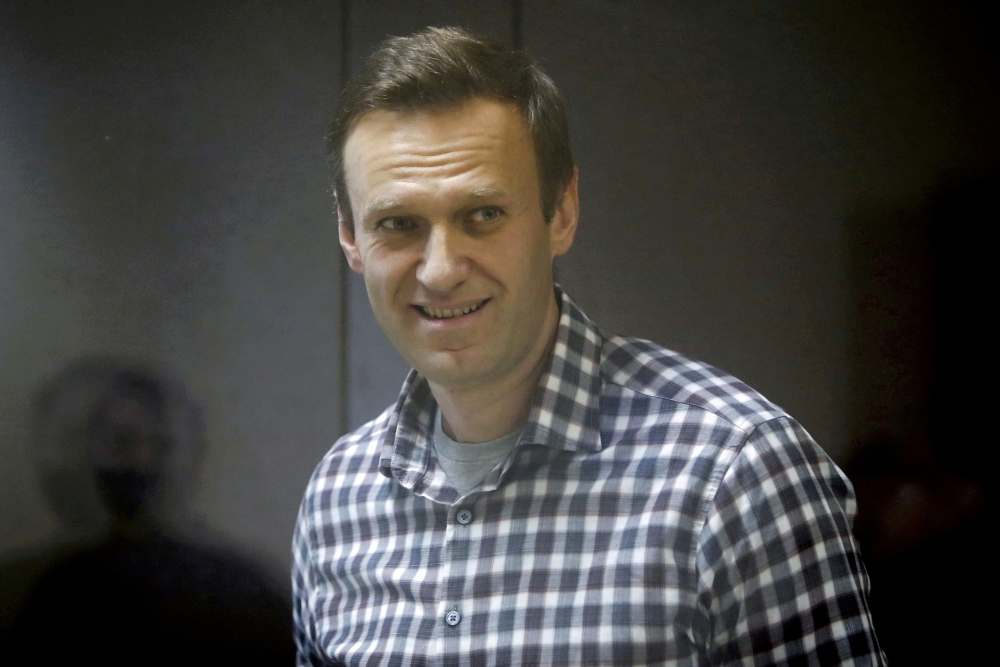 FILE PHOTO: Russian opposition politician Alexei Navalny attends a court hearing in Moscow, Russia February 20, 2021. REUTERS/Maxim Shemetov//File Photo