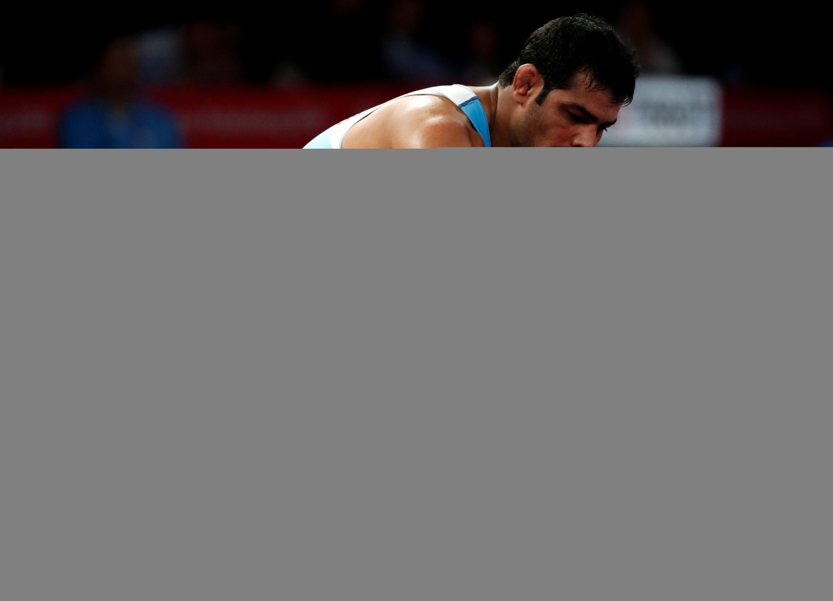 FILE PHOTO: Wrestling - 2018 Asian Games - Men's Freestyle 74 kg Qualifications - JCC - Assembly Hall - Jakarta, Indonesia - August 19, 2018 - Sushil Kumar of India in action with Adam Batirov of Bahrain. REUTERS/Issei Kato/File Photo
