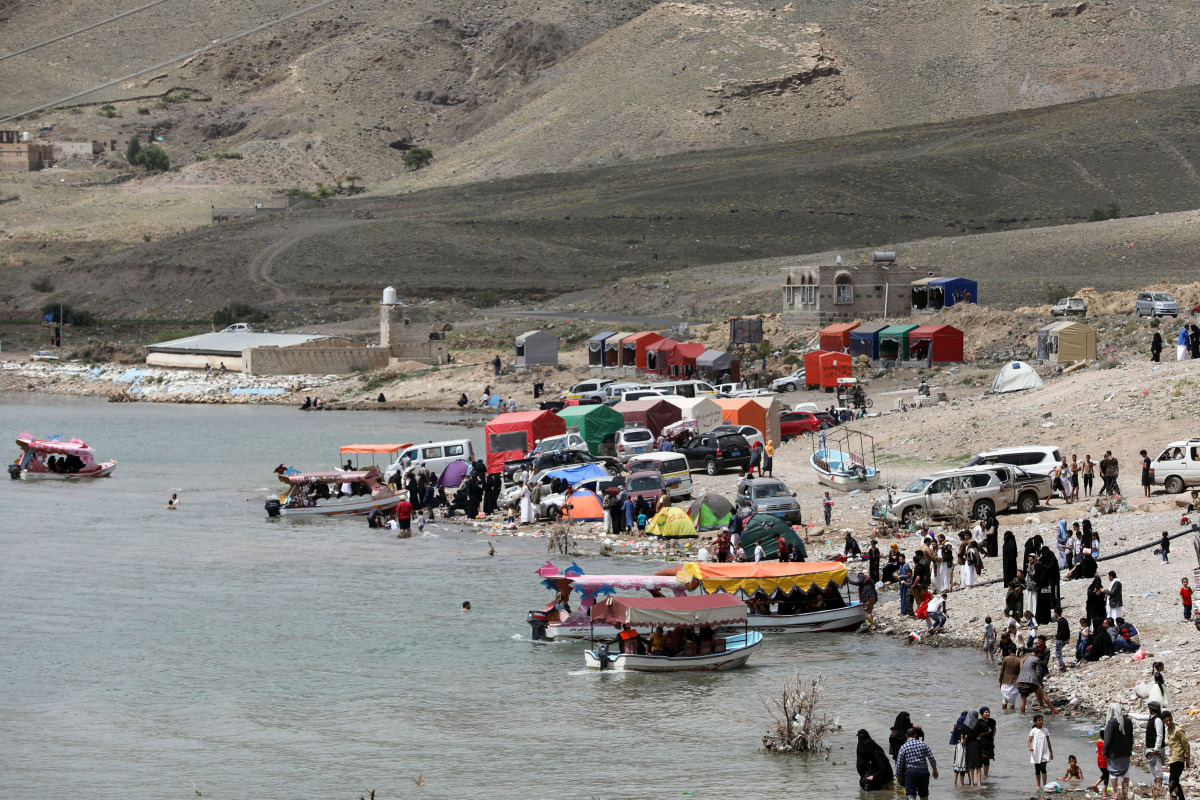 People gather during an excursion at a dam in Sayyan near Sanaa, Yemen May 16, 2021. Picture taken May 16, 2021. REUTERS/Khaled Abdullah
