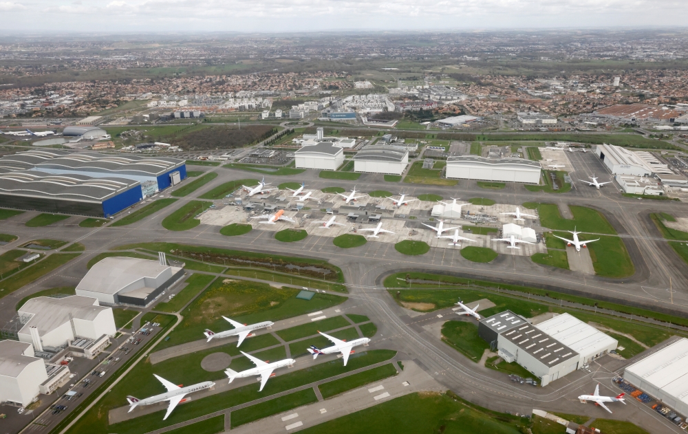Planes are seen parked at Toulouse-Blagnac international airport in this aerial photo taken over Blagnac, France, March 12, 2021. REUTERS/Stephane Mahe/File Photo