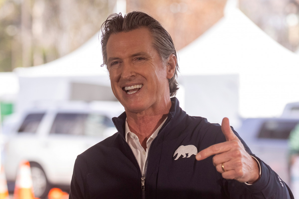 FILE PHOTO: California Governor Gavin Newsom speaks at the opening of the country's first federal and state operated community vaccination site during the outbreak of the coronavirus disease (COVID-19) in Los Angeles, California, U.S., February 16, 2021. 
