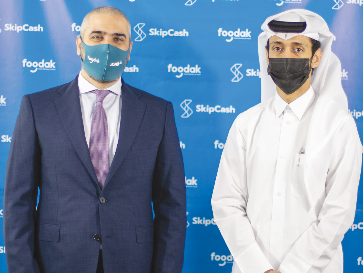 Officials of SkipCash and Foodak during the event.