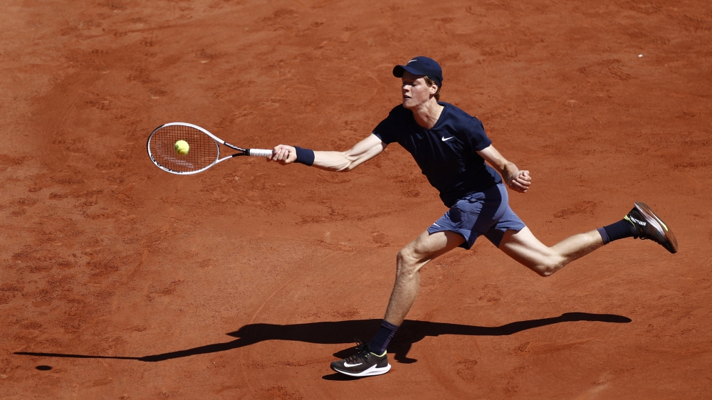Italy's Jannik Sinner in action during his first round match against France's Pierre-Hugues Herbert. (Reuters/Christian Hartmann)