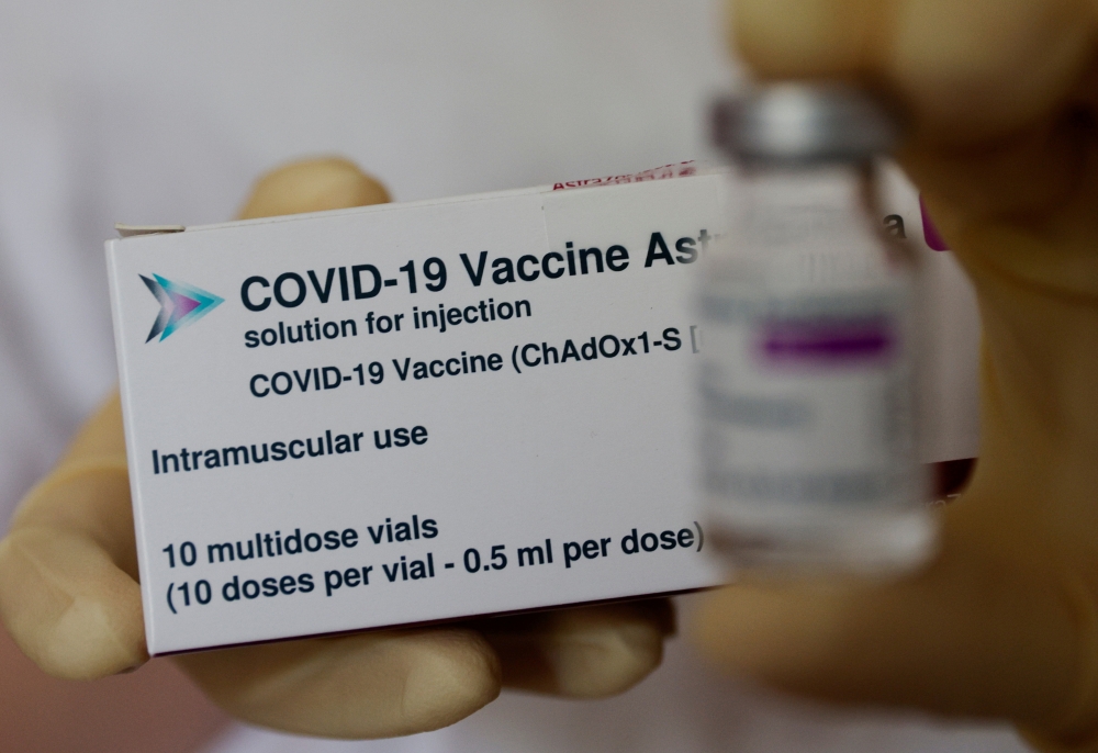 A box and a vial of AstraZeneca's COVID-19 vaccine are seen in a general practice facility, as the spread of the coronavirus disease (COVID-19) continues, in Vienna, Austria May 18, 2021. REUTERS/Leonhard Foeger/File Photo