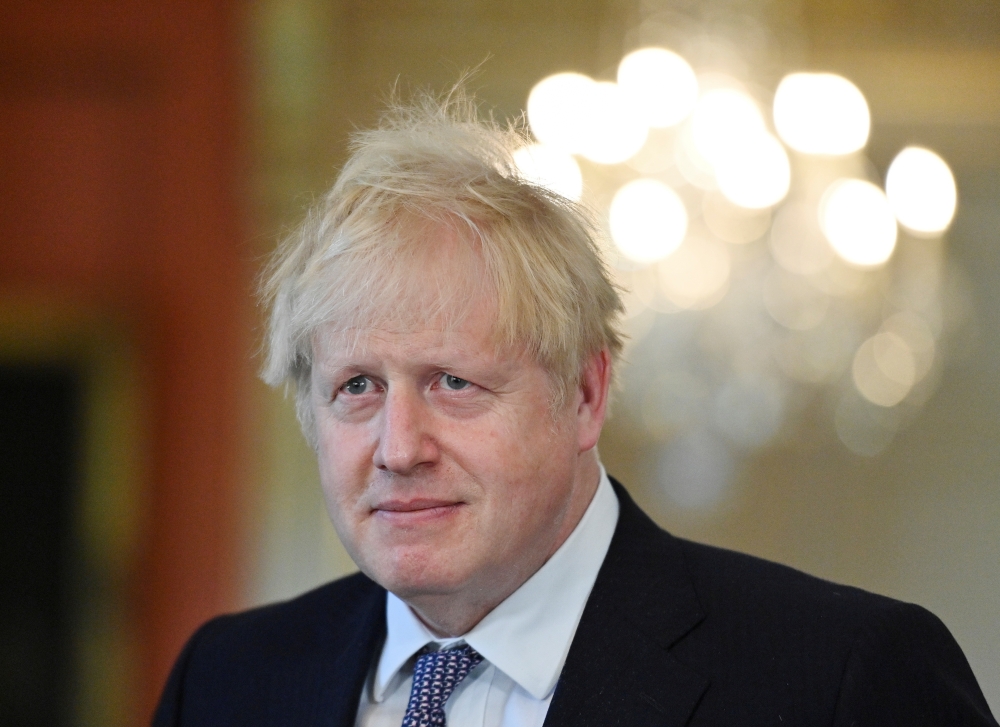 Britain's Prime Minister Boris Johnson attends a news conference following a meeting with NATO Secretary-General Jens Stoltenberg (not seen) at Downing Street in London, Britain June 2, 2021. Justin Tallis/Pool vi Reuters