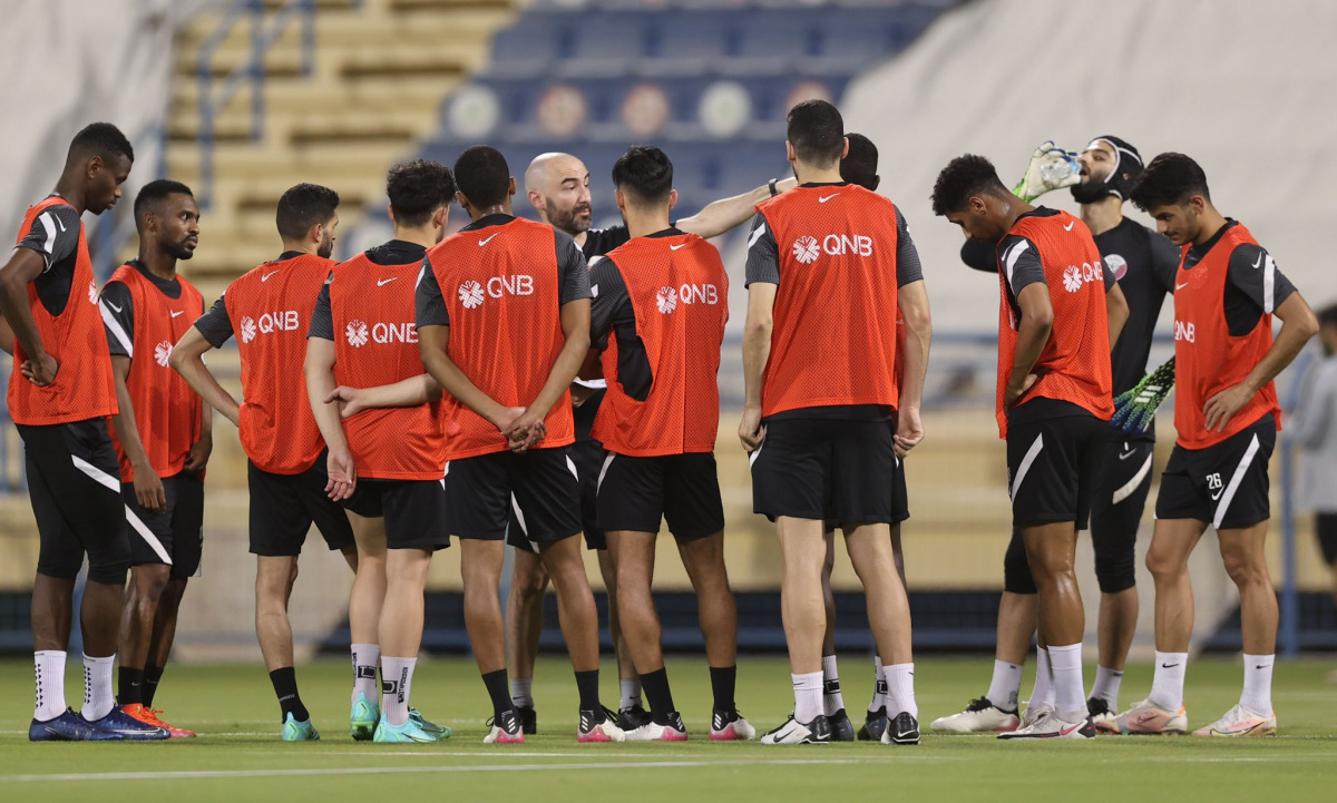 Qatar players during a training session yesterday.