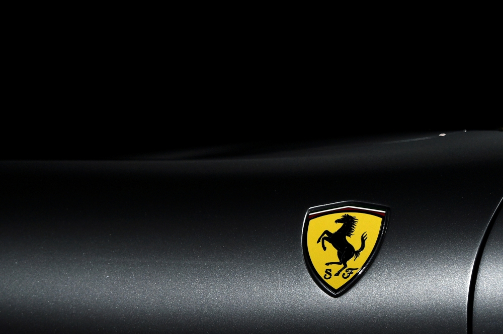 FILE PHOTO: The Ferrari logo is pictured as Ferrari Roma is unveiled during its first world presentation in Rome, Italy, November 14, 2019. REUTERS/Guglielmo Mangiapane