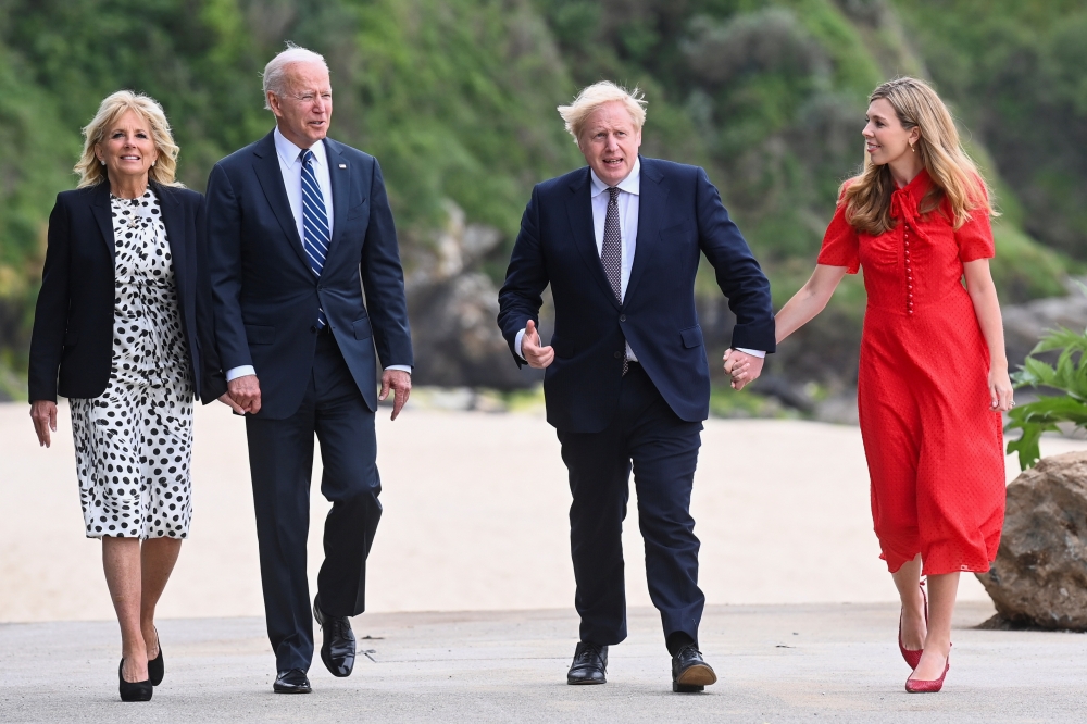 Britain's Prime Minister Boris Johnson, his wife Carrie Johnson and U.S. President Joe Biden with first lady Jill Biden walk outside Carbis Bay Hotel, Carbis Bay, Cornwall, Britain June 10, 2021. (REUTERS/Toby Melville)