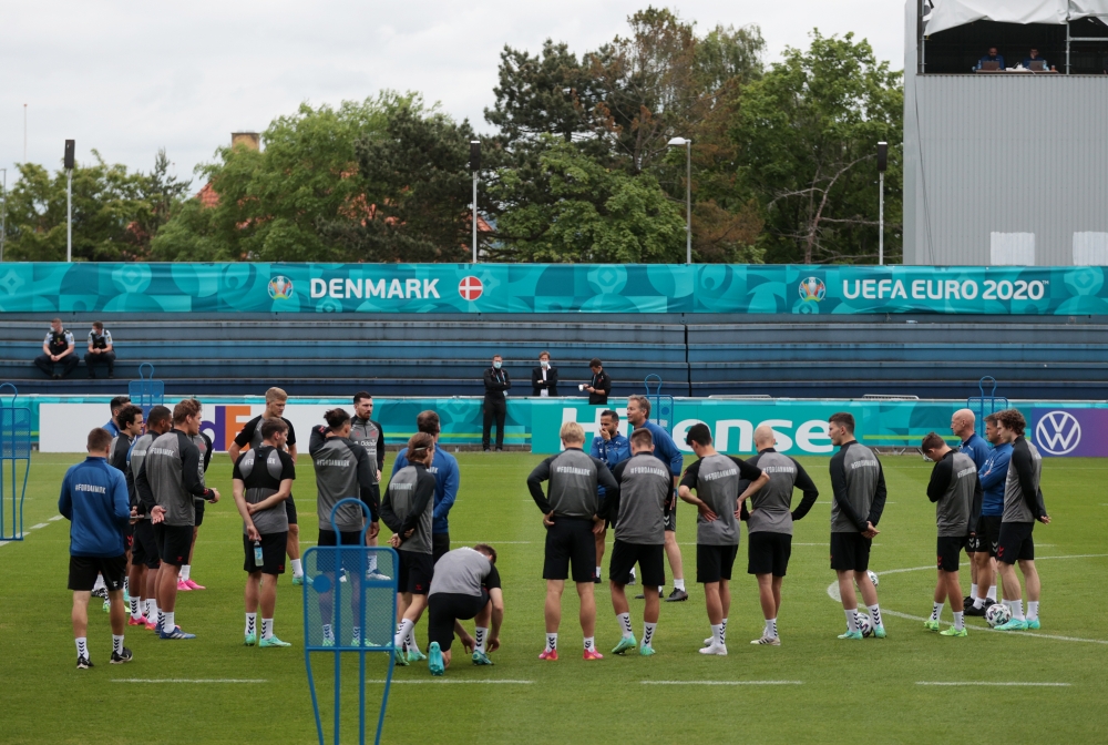General view of Denmark players and coaches during training REUTERS/Hannah Mckay
