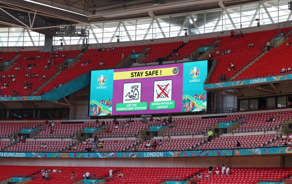 Soccer Football - Euro 2020 - Group D - England v Croatia - Wembley Stadium, London, Britain - June 13, 2021 General view of the big screen as it displays a Stay Safe message for fans Pool via REUTERS/Catherine Ivill
