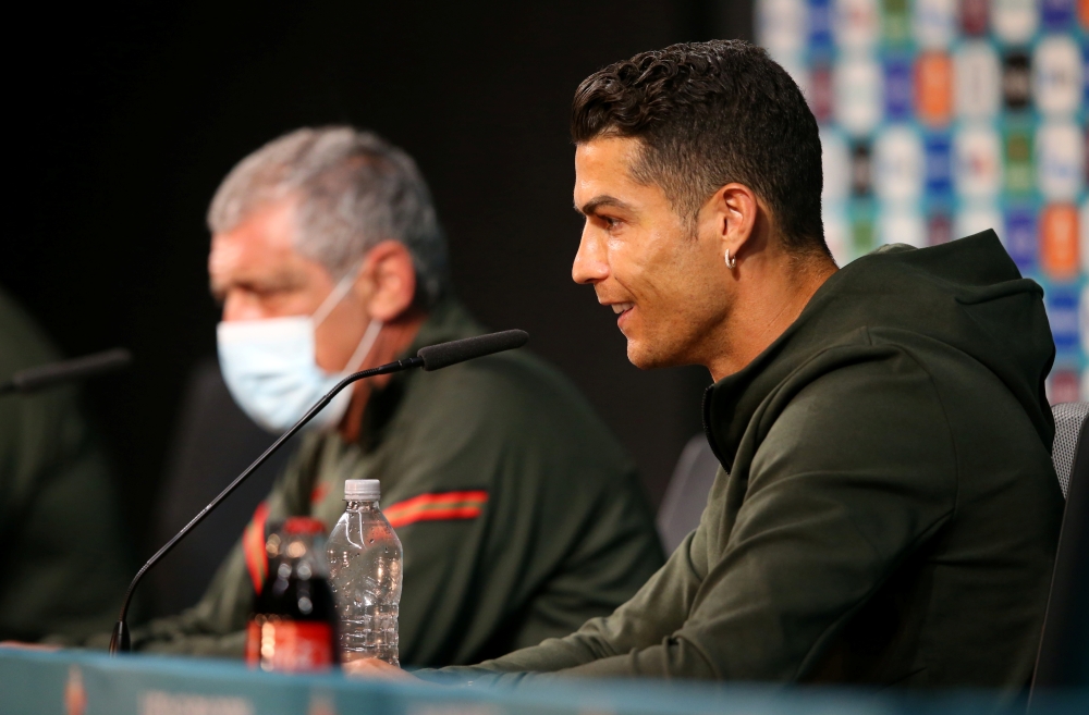 Portugal's Cristiano Ronaldo and Fernando Santos during the press conference 