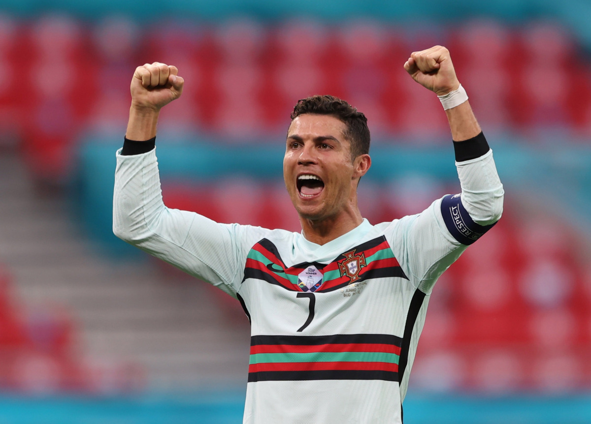 Soccer Football - Euro 2020 - Group F - Hungary v Portugal - Puskas Arena, Budapest, Hungary - June 15, 2021 Portugal's Cristiano Ronaldo celebrates scoring their third goal Pool via REUTERS/Alex Pantling
