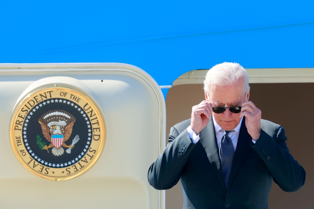 US President Joe Biden steps off Air Force One at Cointrin airport as he arrives ahead of a meeting with Russian counterpart Vladimir Putin in Geneva, Switzerland, June 15, 2021. Reuters/Denis Balibouse/Pool 