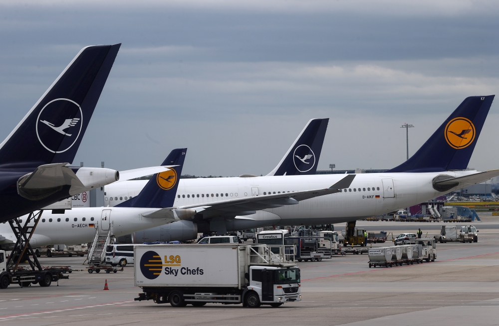 Planes of German air carrier Lufthansa are photographed at the day of the airline's annual general meeting at the airport in Frankfurt, Germany, May 4, 2021. Reuters/Kai Pfaffenbach/File Photo