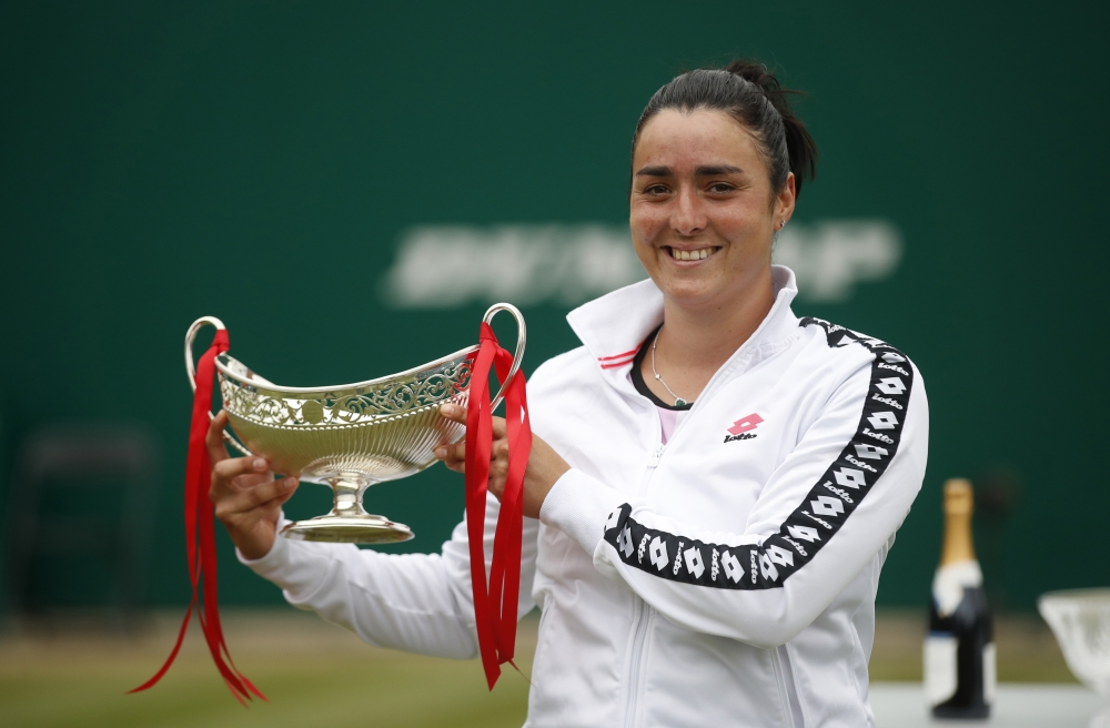 Tunisia's Ons Jabeur celebrates with the trophy after winning her final match against Russia's Daria Kasatkina Action Images via Reuters/Matthew Childs