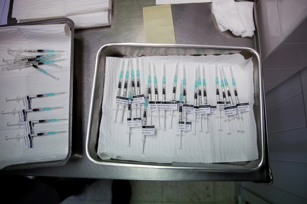 Pfizer-BioNTech coronavirus disease (COVID-19) vaccines are seen at Sao Jose Hospital in Lisbon, Portugal, January 19, 2021. REUTERS/Pedro Nunes/File Photo