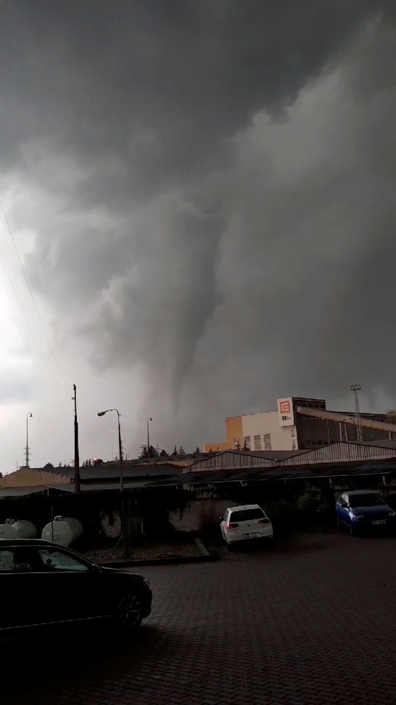 A tornado is seen in Hodonin, Czech Republic, June 24, 2021, in this still image from video obtained via social media. Zdenek Kostiha via REUTERS 
