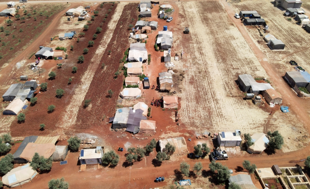 An aerial view shows tents at a camp for internally displaced people in northern Idlib, Syria, June 10, 2021. Picture taken with a drone June 10, 2021. REUTERS/Khalil Ashawi