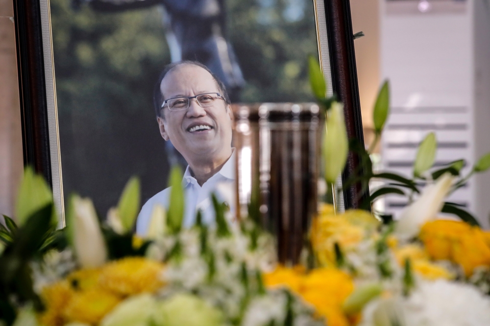 A view of the urn and portrait of former Philippine President Benigno Aquino during a public viewing at the Church of Gesu, Ateneo de Manila University in Quezon City, Metro Manila, Philippines June 25, 2021. Mark Cristino