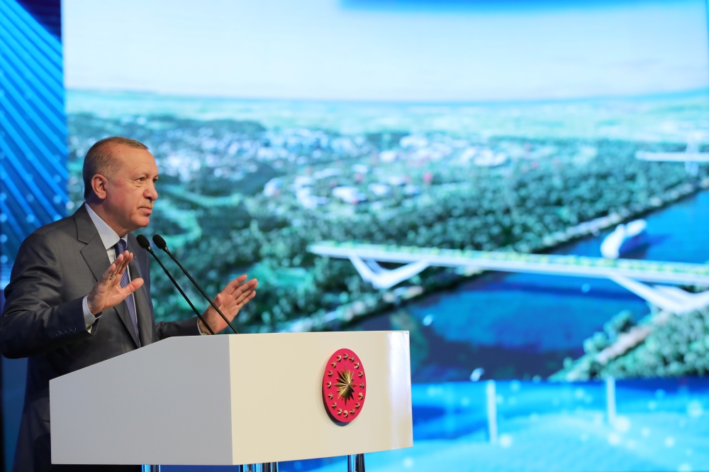 Turkish President Tayyip Erdogan speaks during the groundbreaking ceremony of Sazlidere Bridge over the planned route of Kanal Istanbul, in Istanbul, Turkey June 26, 2021. (Handout via Reuters)