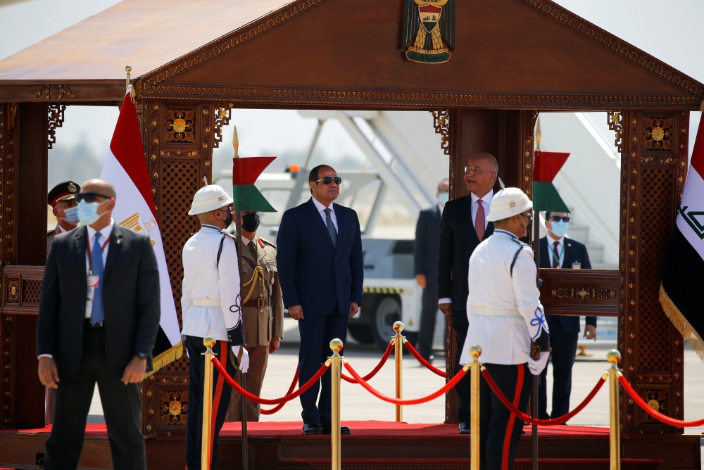 Iraqi President Barham Salih receives Egyptian President Abdel Fattah Al-Sisi at Baghdad International Airport in Baghdad, Iraq June 27, 2021. REUTERS/Khalid al-Mousily