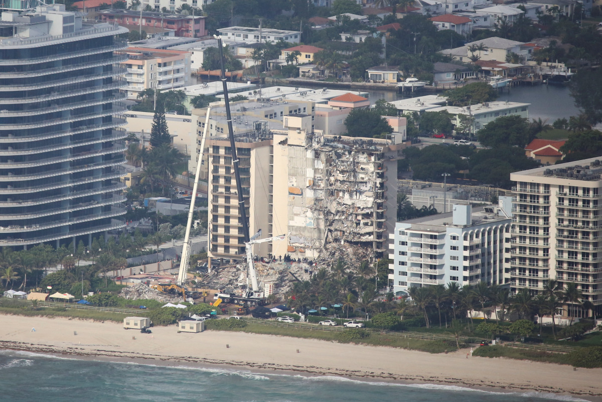 Aerial view shows the partially collapsed residential building in Surfside near Miami Beach, Florida, U.S. June 27, 2021. REUTERS/Marco Bello
