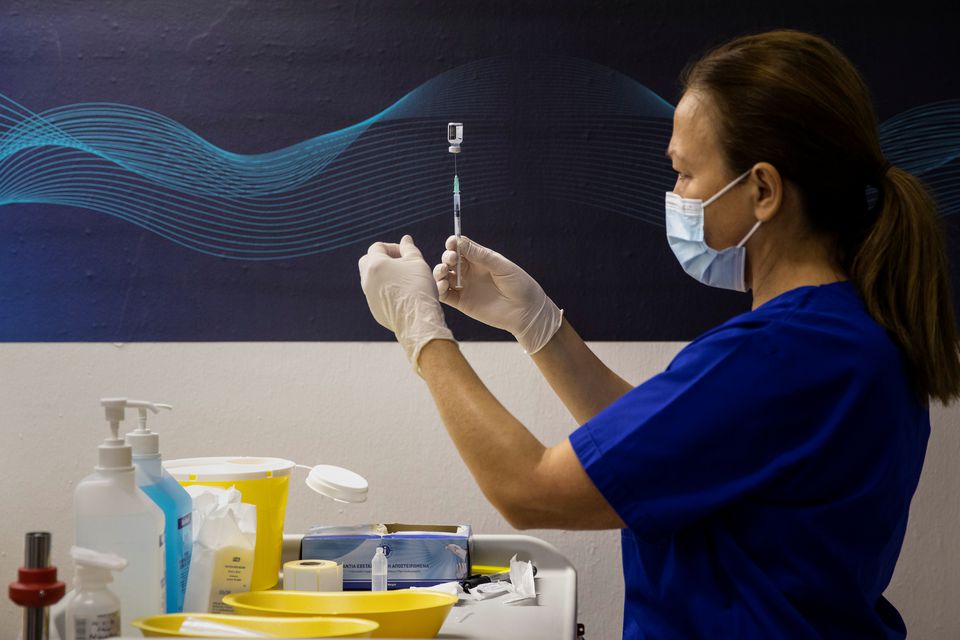 FILE PHOTO: A nurse prepares a vaccine against the coronavirus disease (COVID-19) in Athens, Greece, January 16, 2021. REUTERS/Alkis Konstantinidis