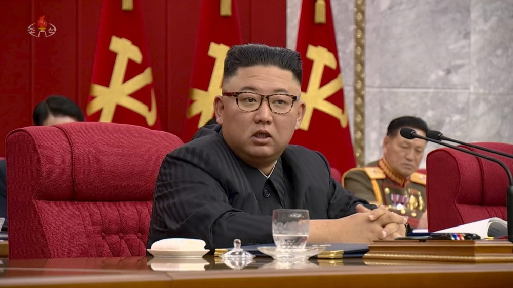 North Korean Leader Kim Jong Un speaks at plenary meeting of 8th central committee of the Workers' Party of Korea in this still image taken from KRT footage on June 16, 2021. 